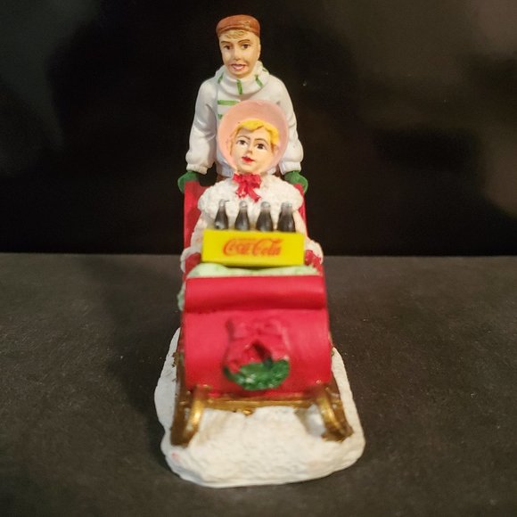 Coca-Cola "Town Square Collection" Man Pushing Woman on Sled 1994 - Picture 1 of 5
